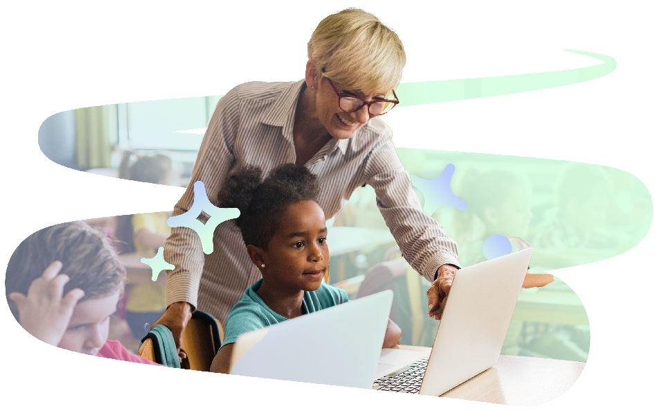 Teacher assisting student in a computer lab